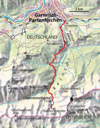 Kartenausschnitt einer Wanderroute von Garmisch-Partenkirchen in Deutschland zur Oberreintalhütte an der Grenze zu Österreich, mit Höhenangaben von Bergen und markierten Hütten.