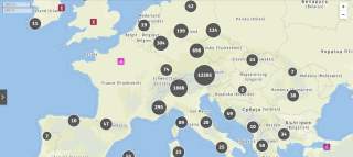 Karte von Europa mit markierten Zahlenpunkten, die verschiedene Mengen anzeigen, sowie Symbolen für zu Fuß und Fahrrad. Die größte Zahl befindet sich auf Österreich mit 12.205.